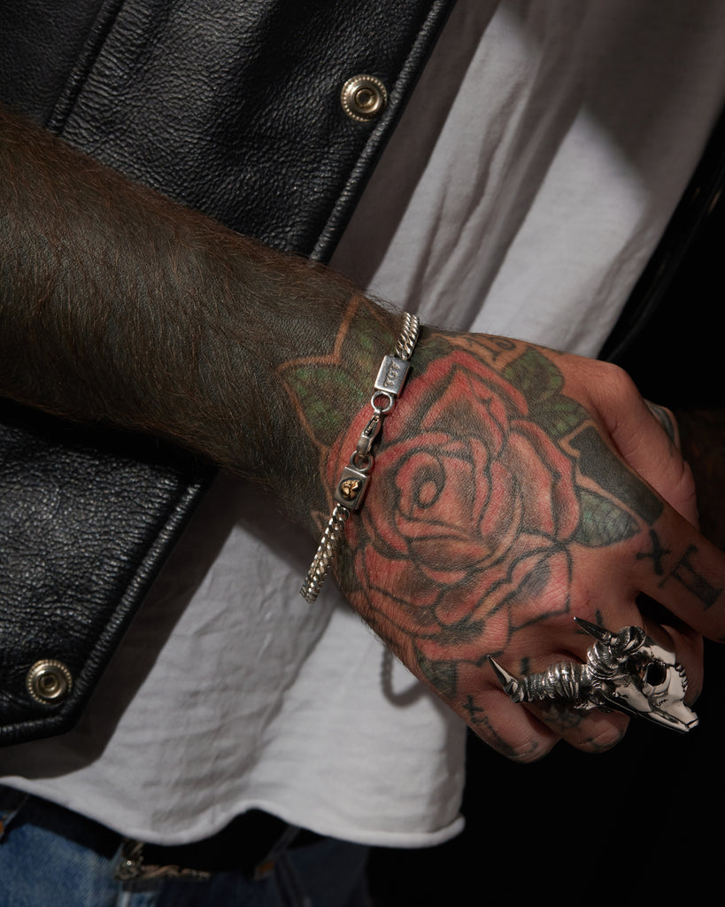 Flat Curb Chain Bracelet With 18ct Skull