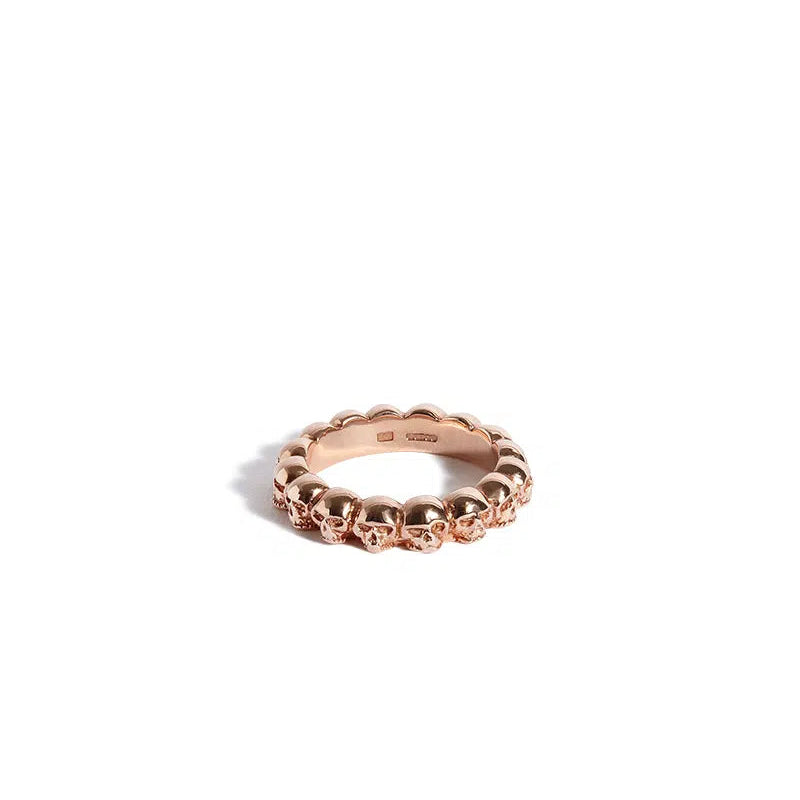 Solid 9ct Rose Gold Band of Skulls