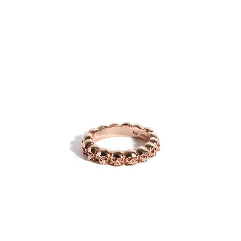 Solid 9ct Rose Gold Band of Skulls