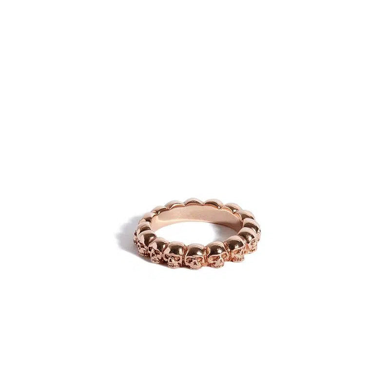 Solid 9ct Rose Gold Band of Skulls